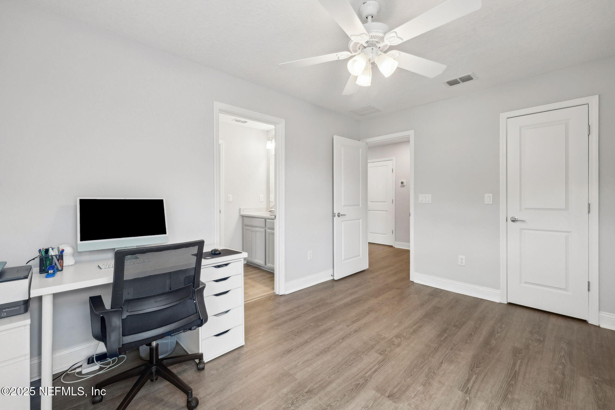 228 Killarney Avenue St. Johns, FL 32259 - Photo 28 of 64 a view of a workspace with furniture and a window