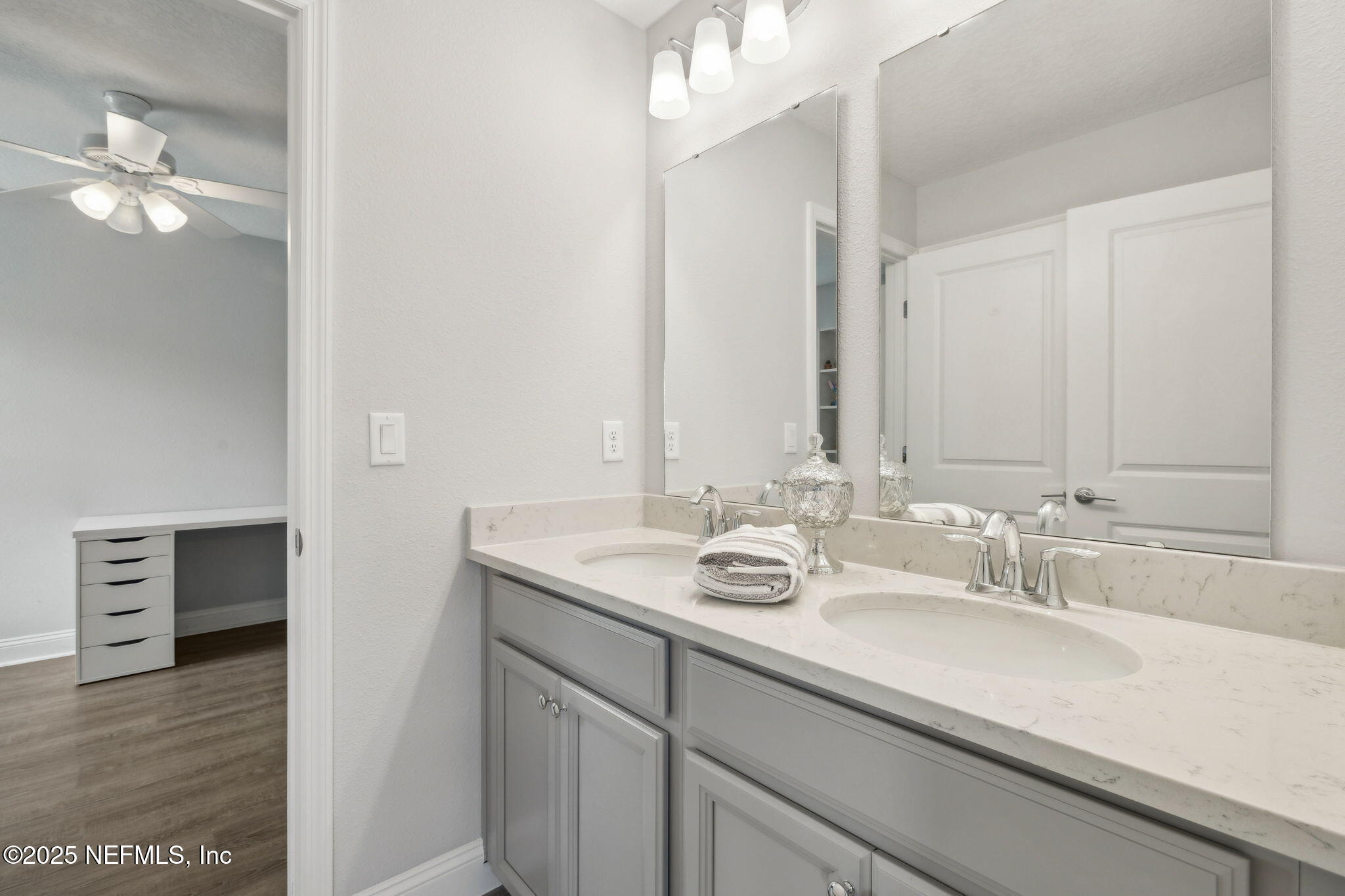 228 Killarney Avenue St. Johns, FL 32259 - Photo 29 of 64 a bathroom with a sink double vanity and a mirror