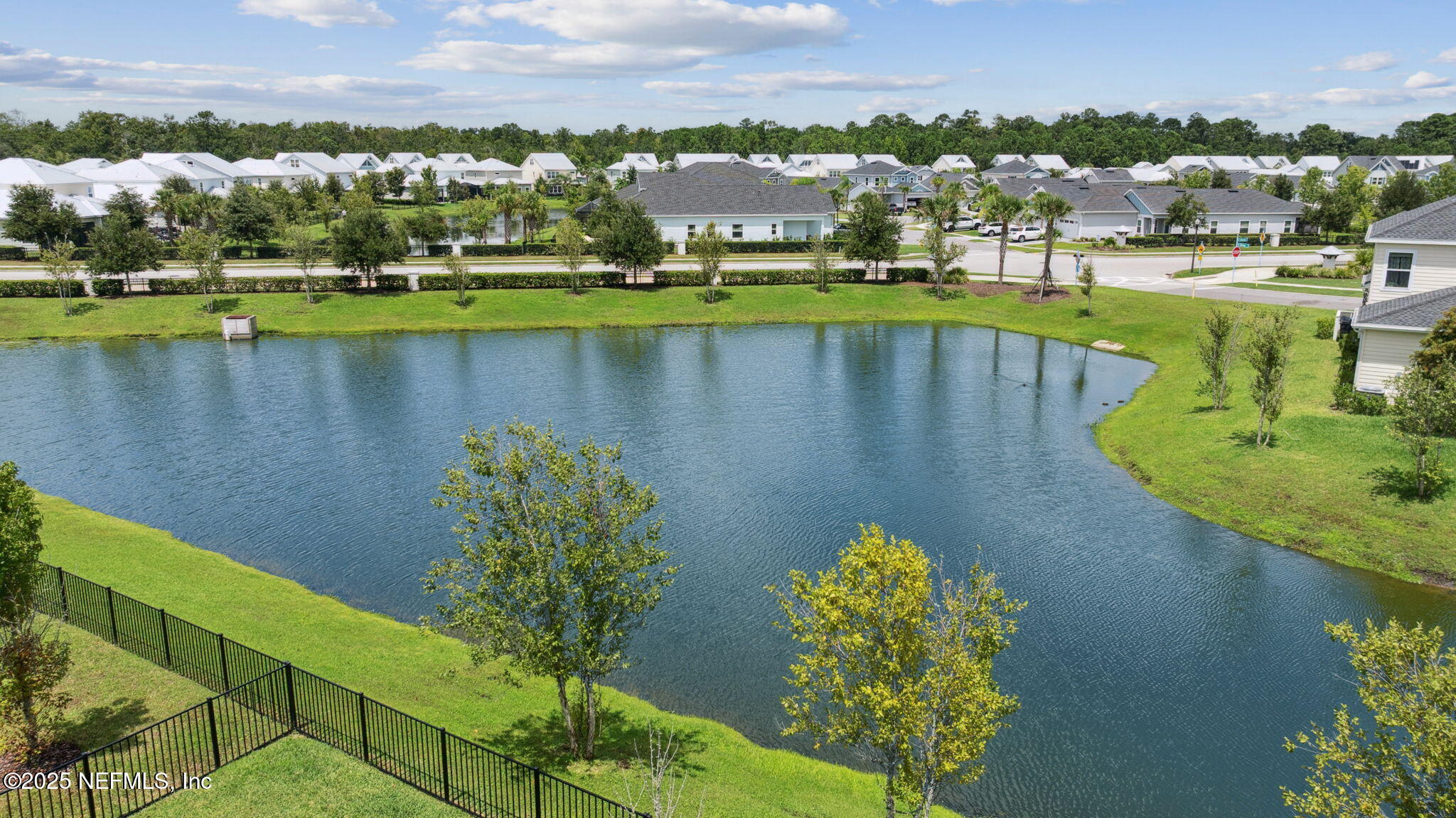 228 Killarney Avenue St. Johns, FL 32259 - Photo 3 of 64 a view of a city with a lake