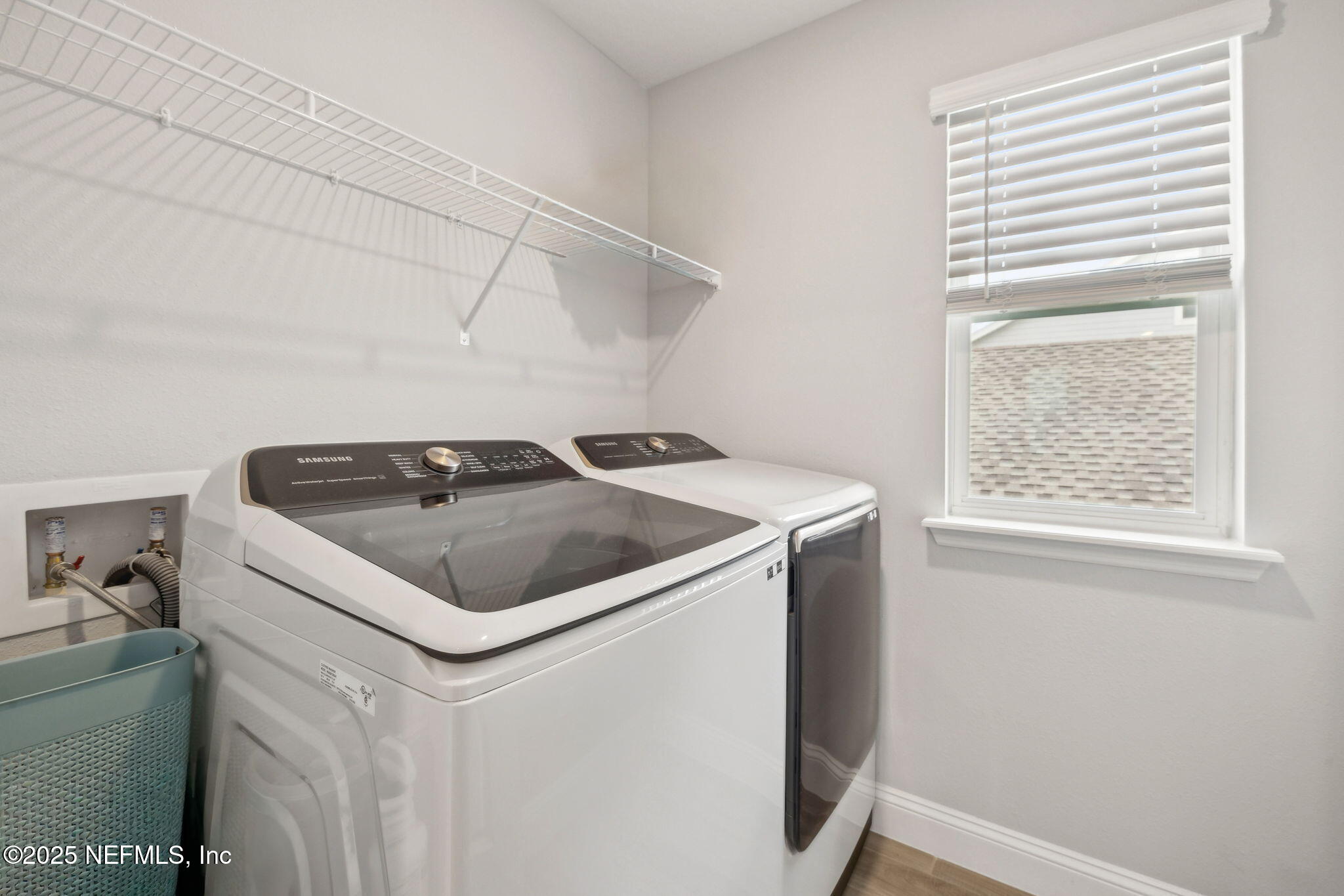 228 Killarney Avenue St. Johns, FL 32259 - Photo 31 of 64 a utility room with dryer and washer