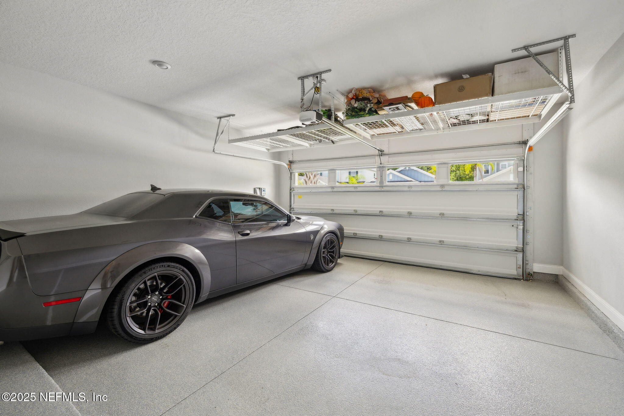 228 Killarney Avenue St. Johns, FL 32259 - Photo 32 of 64 a view of a garage and car parked