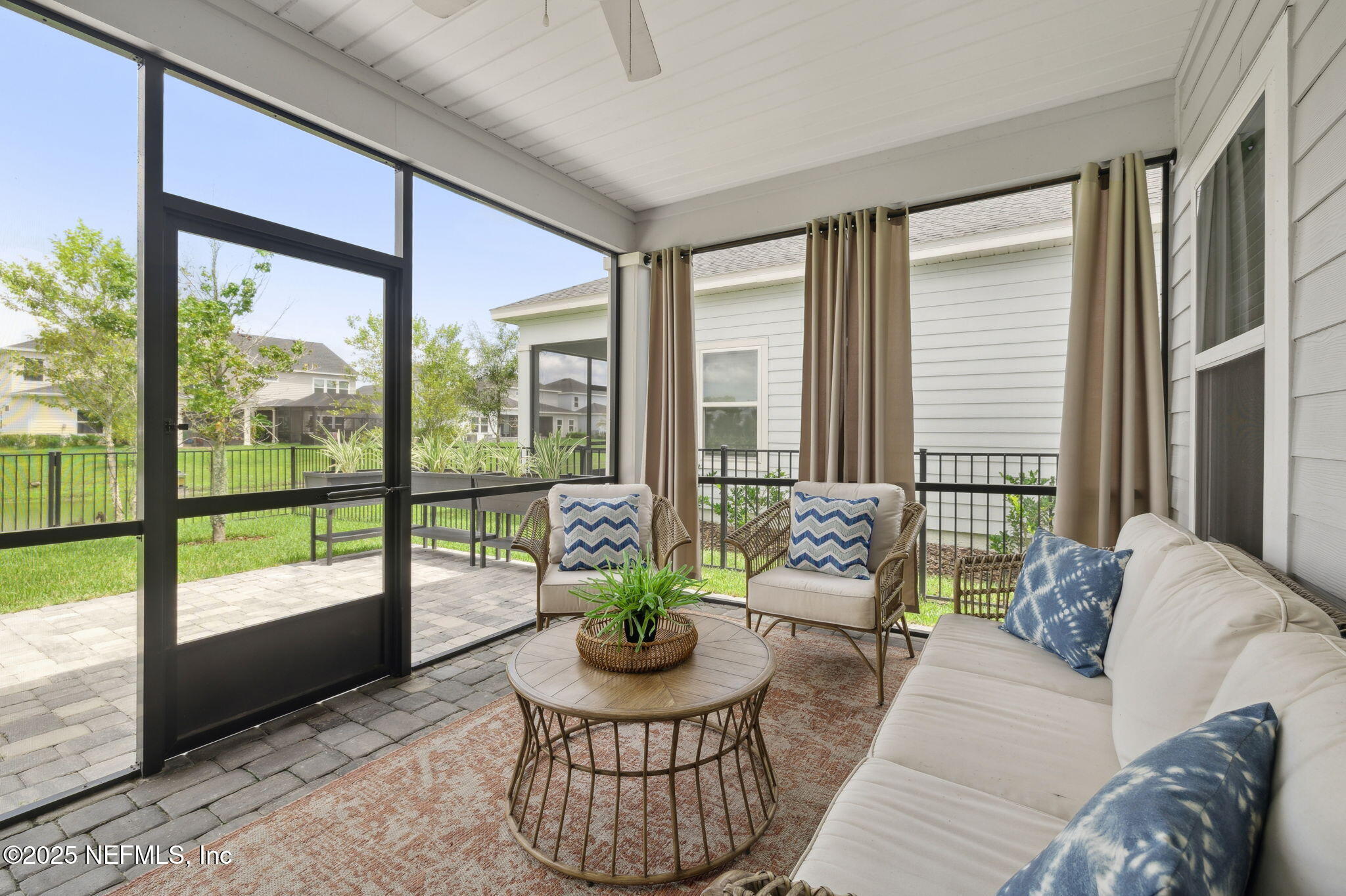 228 Killarney Avenue St. Johns, FL 32259 - Photo 35 of 64 a living room with furniture and a large window