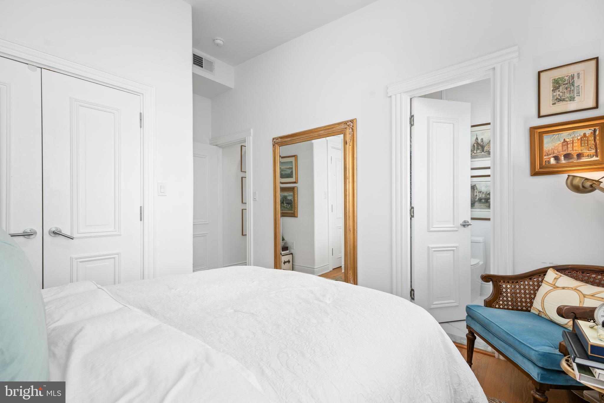 317 3rd Street Southeast, Unit 33 Washington, DC 20003 - Photo 23 of 26 a bedroom with a bed and a couch