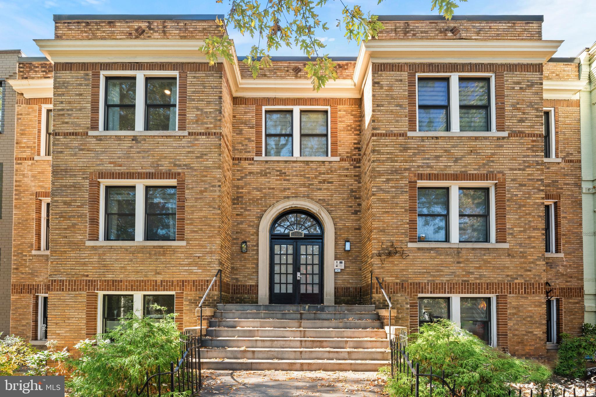 317 3rd Street Southeast, Unit 33 Washington, DC 20003 - Photo 3 of 26 a front view of a house