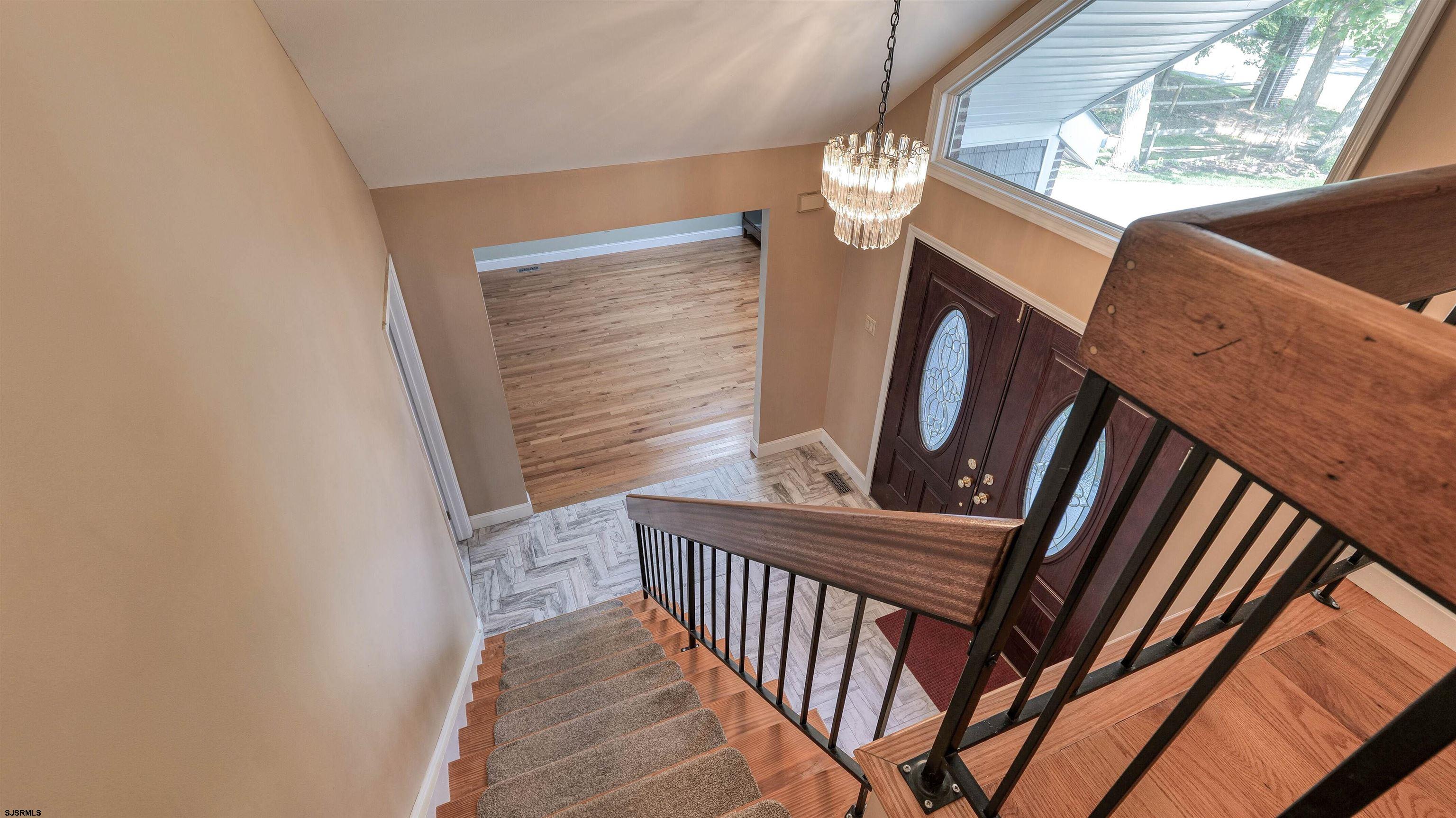 209 Reed Road Absecon, NJ 08201 - Photo 21 of 57 a view of an entryway with a fan