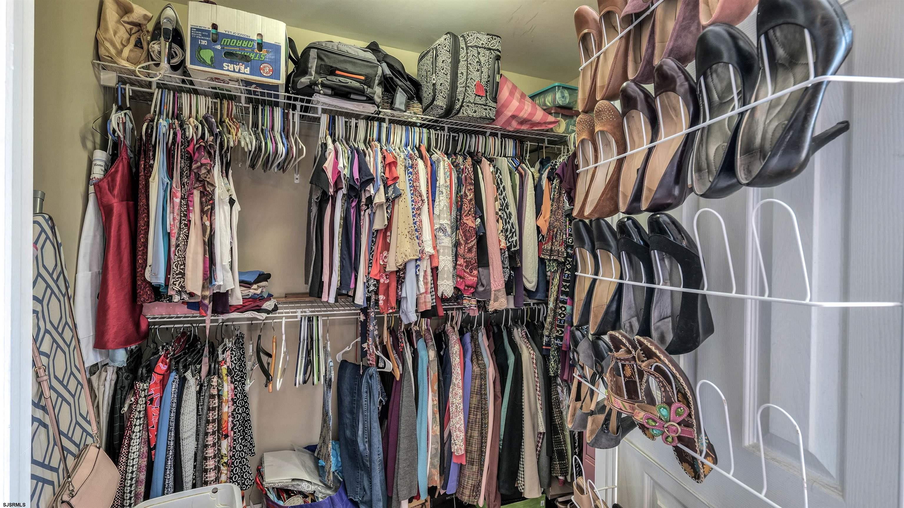 209 Reed Road Absecon, NJ 08201 - Photo 28 of 57 a view of walk in closet with clothes