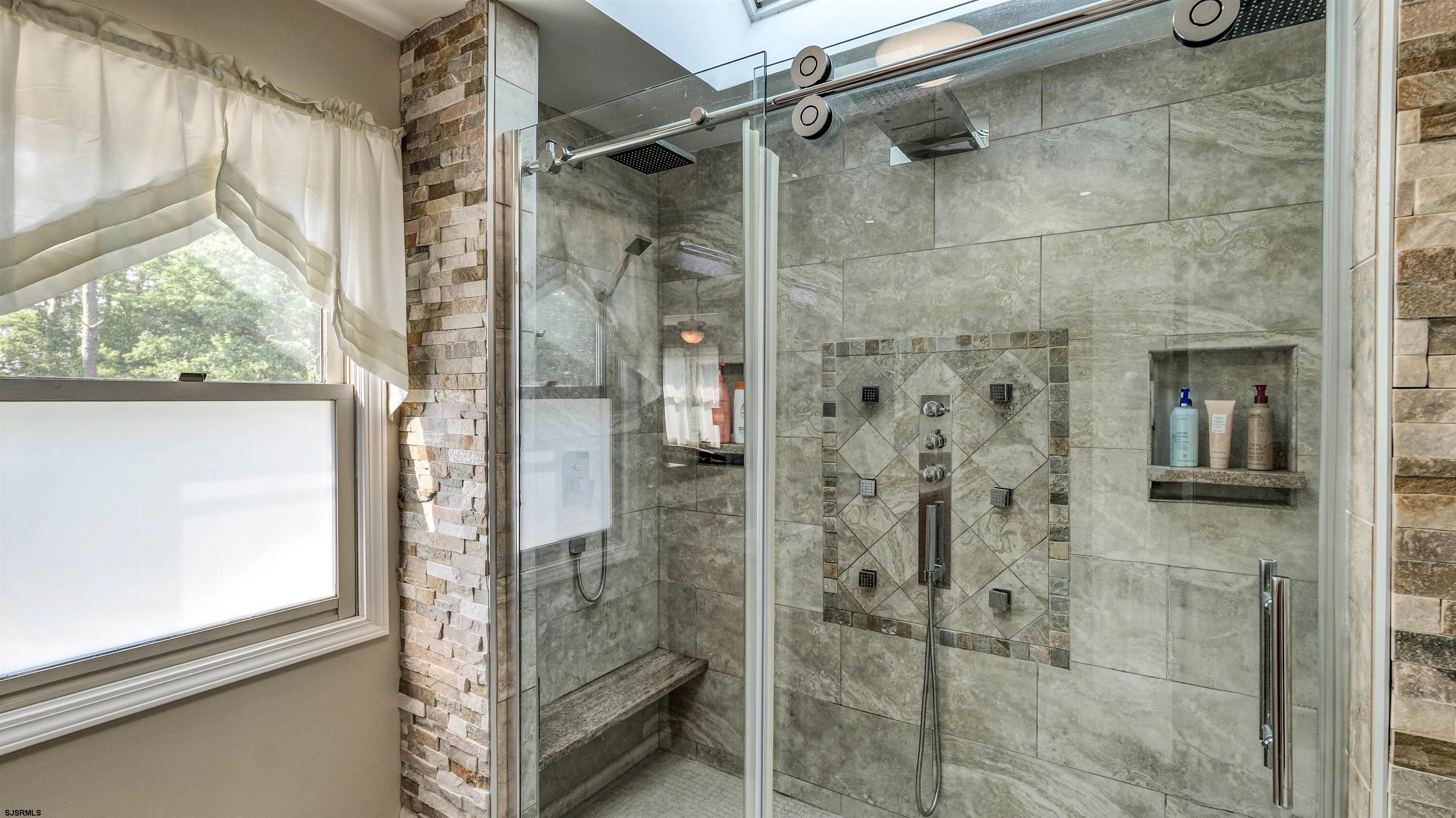 209 Reed Road Absecon, NJ 08201 - Photo 31 of 57 a bathroom with a shower and a window