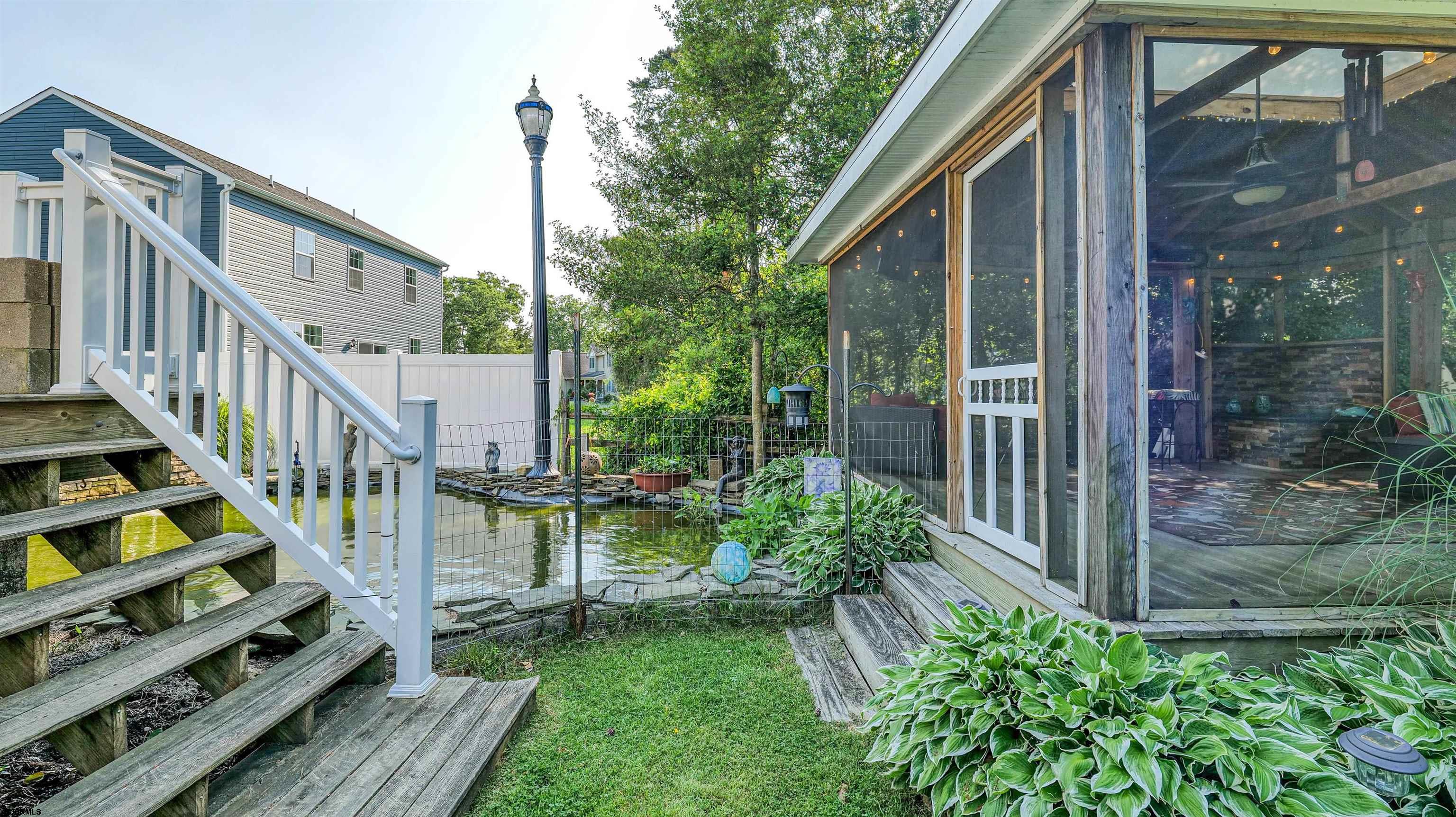 209 Reed Road Absecon, NJ 08201 - Photo 45 of 57 a view of outdoor space and deck