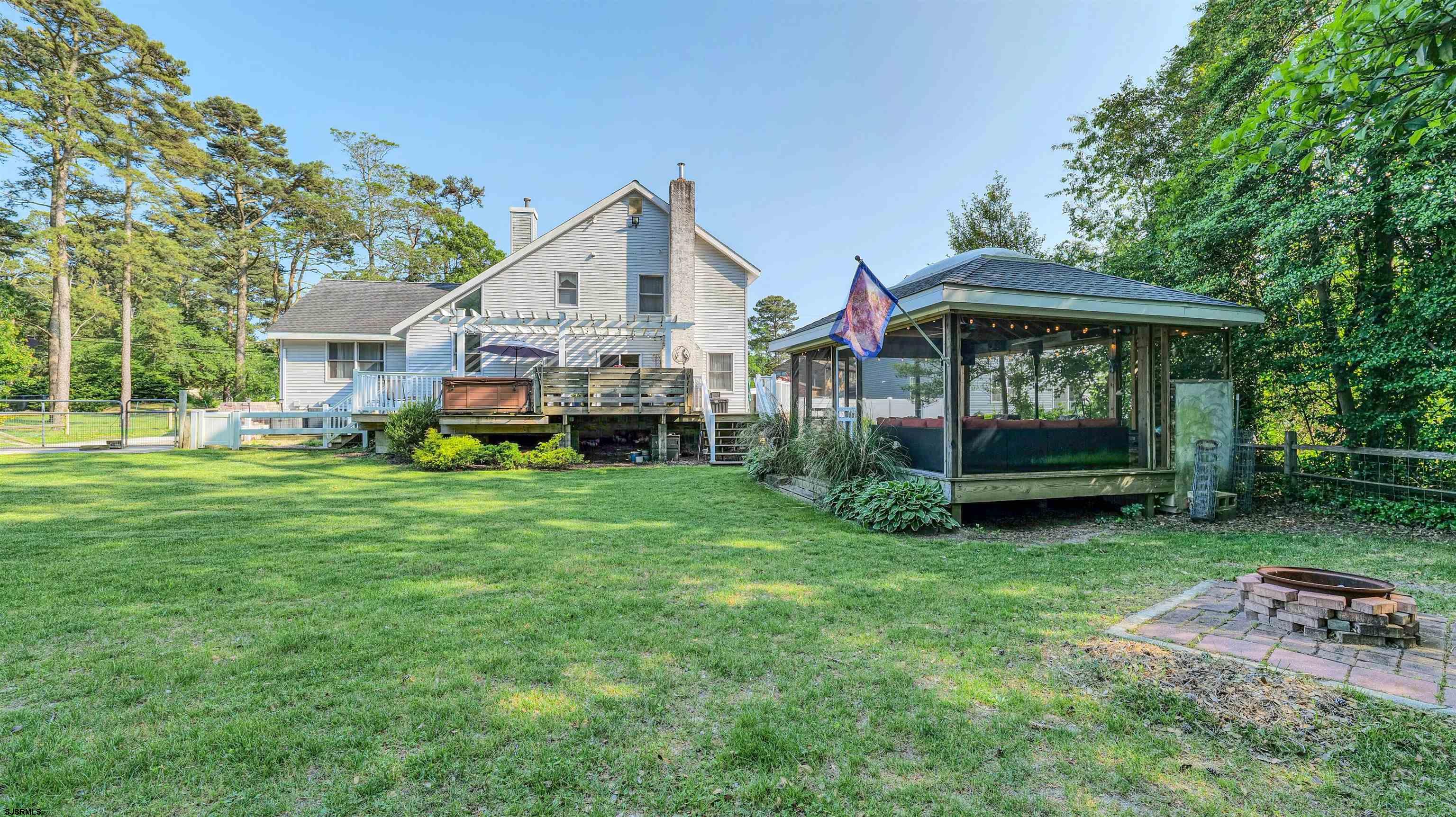 209 Reed Road Absecon, NJ 08201 - Photo 49 of 57 a view of a house with a yard