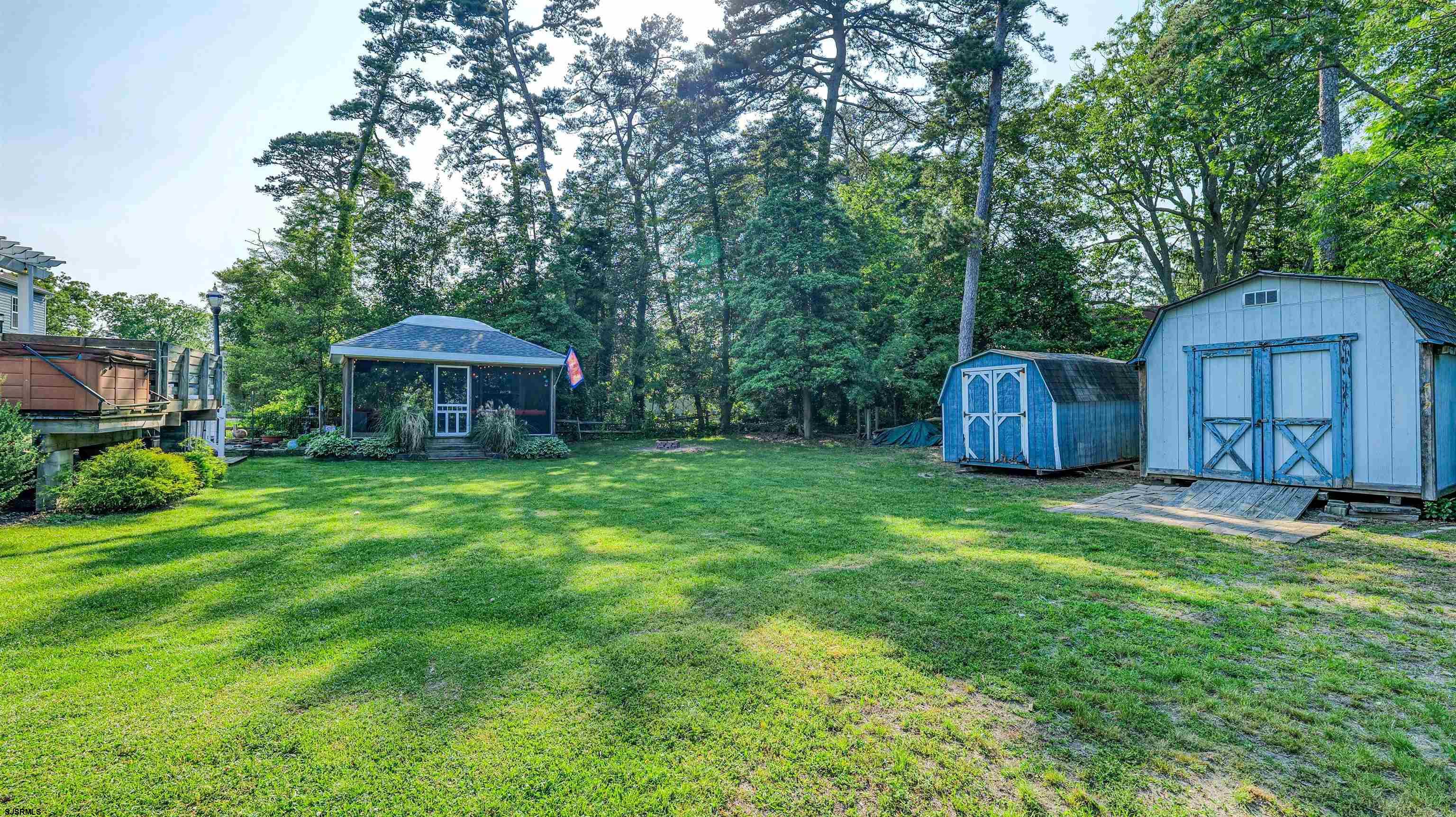 209 Reed Road Absecon, NJ 08201 - Photo 50 of 57 a front view of a house with garden