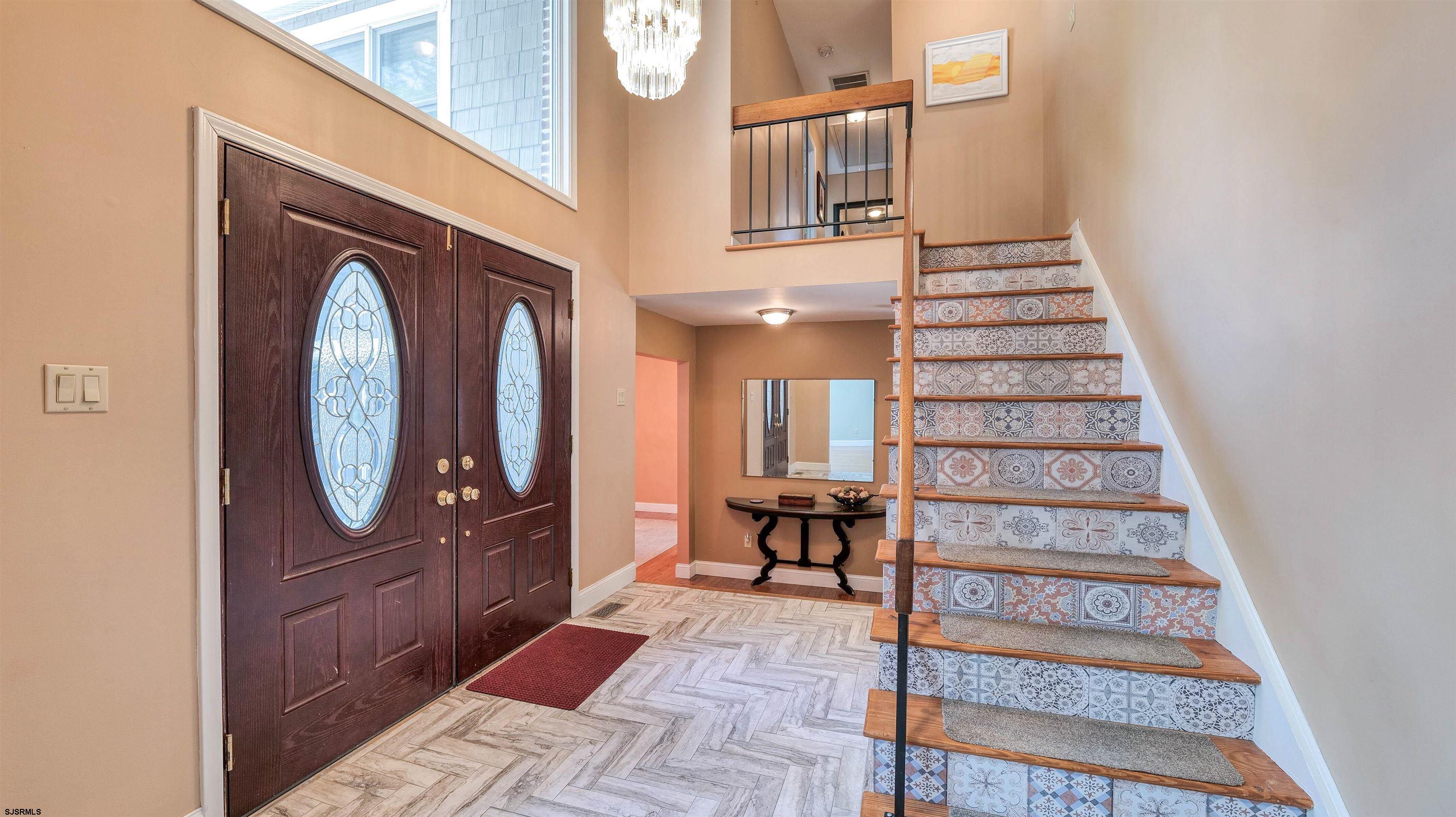 209 Reed Road Absecon, NJ 08201 - Photo 5 of 57 a view of a entryway door of house