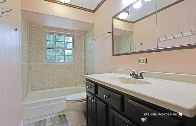 a bedroom with bed and window