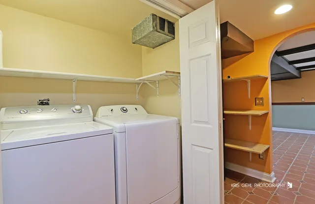 a view of an chairs and tables in the patio