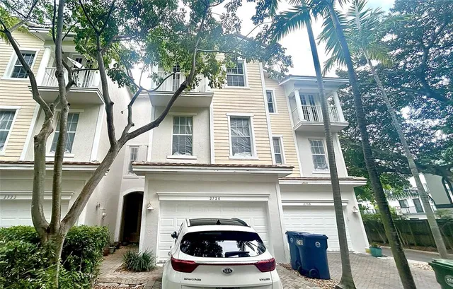 front view of a house with a small yard