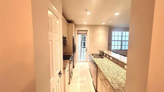 a spacious bathroom with a tub and shower