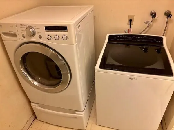 a utility room with dryer and washer