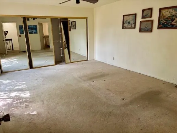a view of a hallway with an entryway