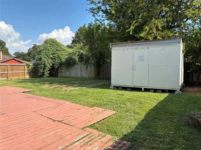 a view of backyard with green space
