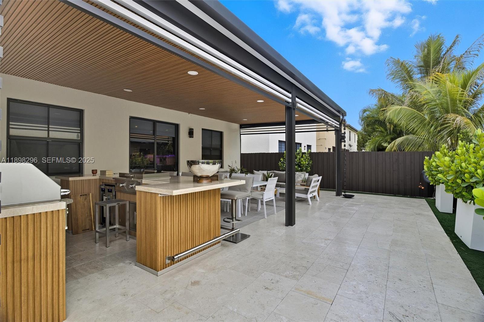 8870 Northwest 99th Path Doral, FL 33178 - Photo 33 of 44 a view of living room and kitchen