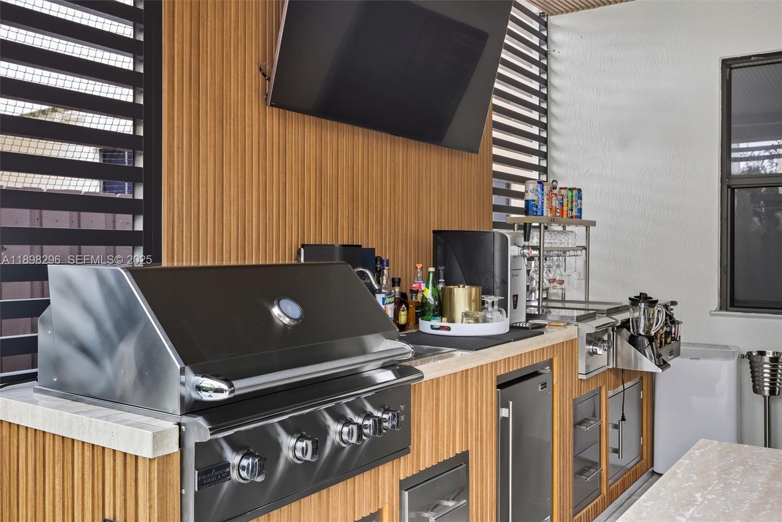 8870 Northwest 99th Path Doral, FL 33178 - Photo 34 of 44 a laptop computer sitting on top of a table