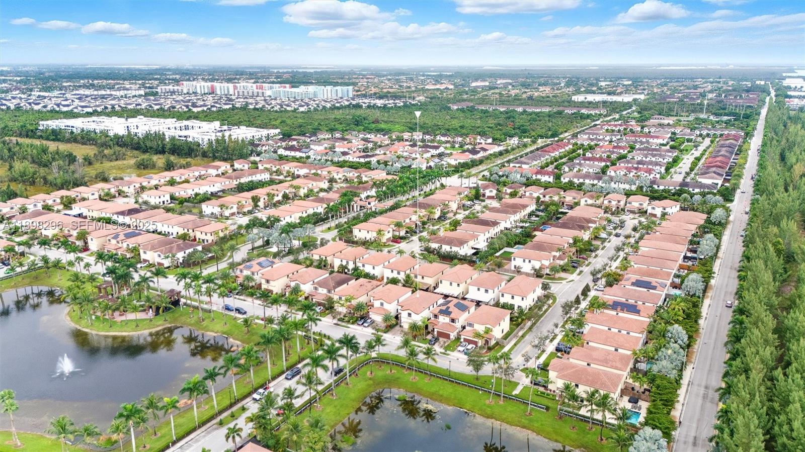8870 Northwest 99th Path Doral, FL 33178 - Photo 37 of 44 an aerial view of city and lake