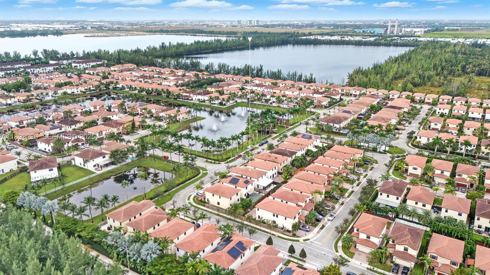 8870 Northwest 99th Path Doral, FL 33178 - Photo 38 of 44 an aerial view of lake residential house with outdoor space and river