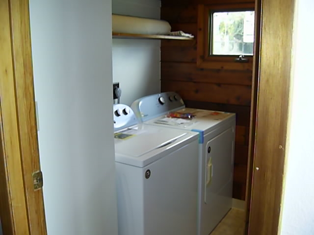 4615 Lower Kula Road Kula, HI 96790 - Photo 11 of 20 a utility room with dryer and washer
