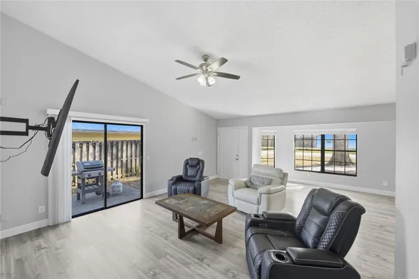 a living room with furniture and a window