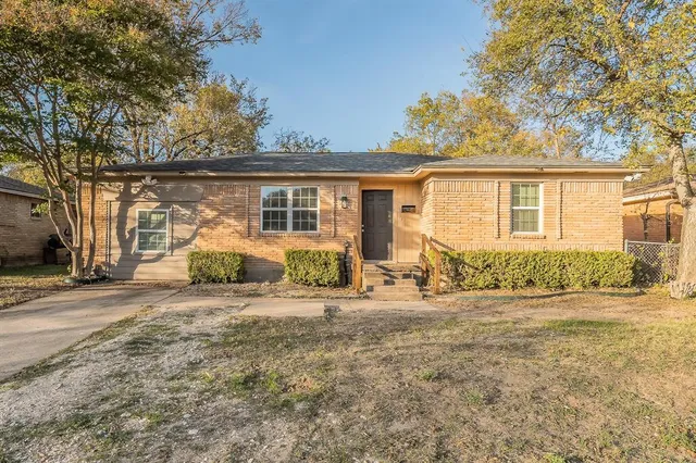 front view of a house with a patio