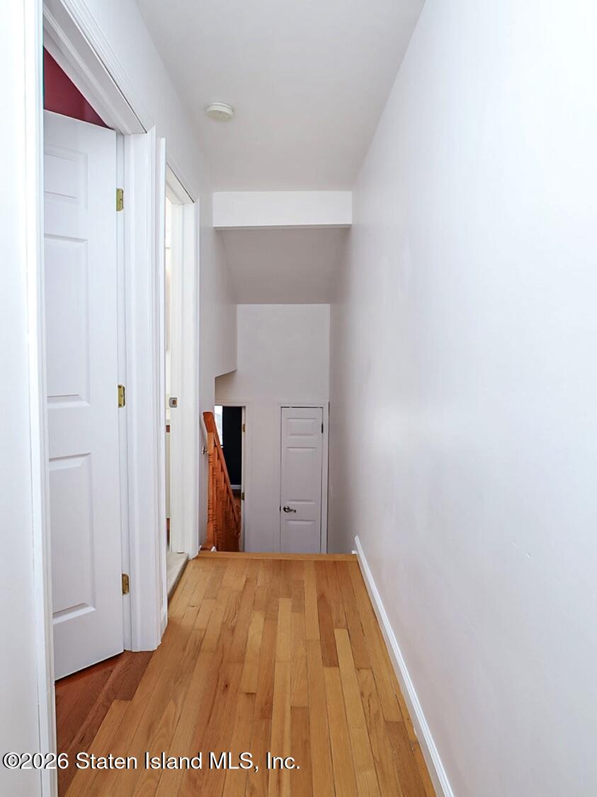 3438 A Amboy Road Staten Island, NY 10306 - Photo 12 of 21 a view of a room with wooden floor
