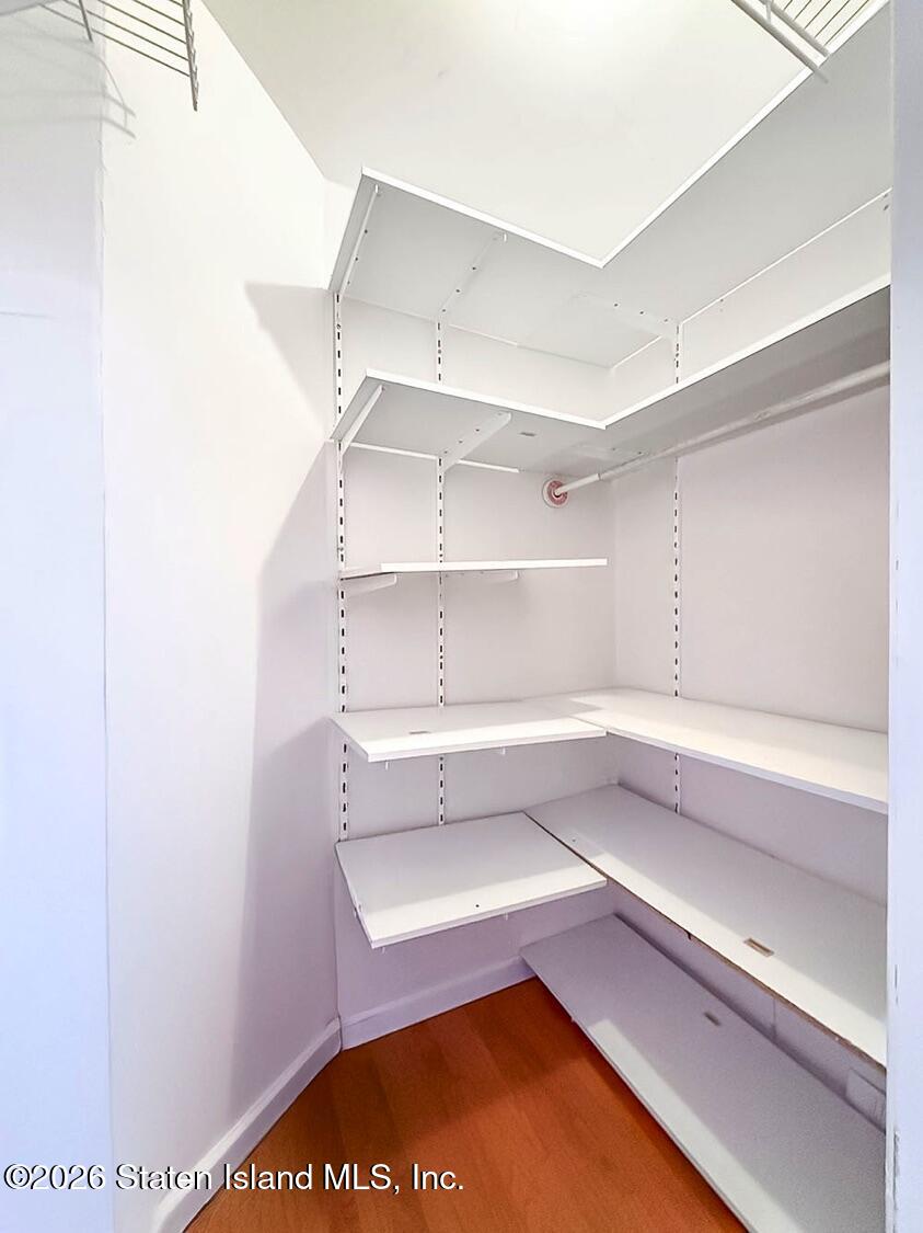 3438 A Amboy Road Staten Island, NY 10306 - Photo 20 of 21 a view of walk in closet with empty racks