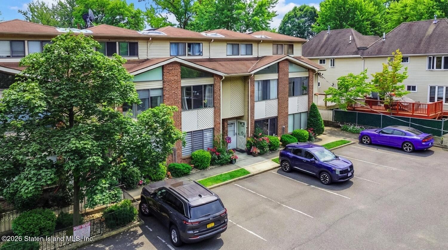 3438 A Amboy Road Staten Island, NY 10306 - Photo 2 of 21 a car parked in front of a house