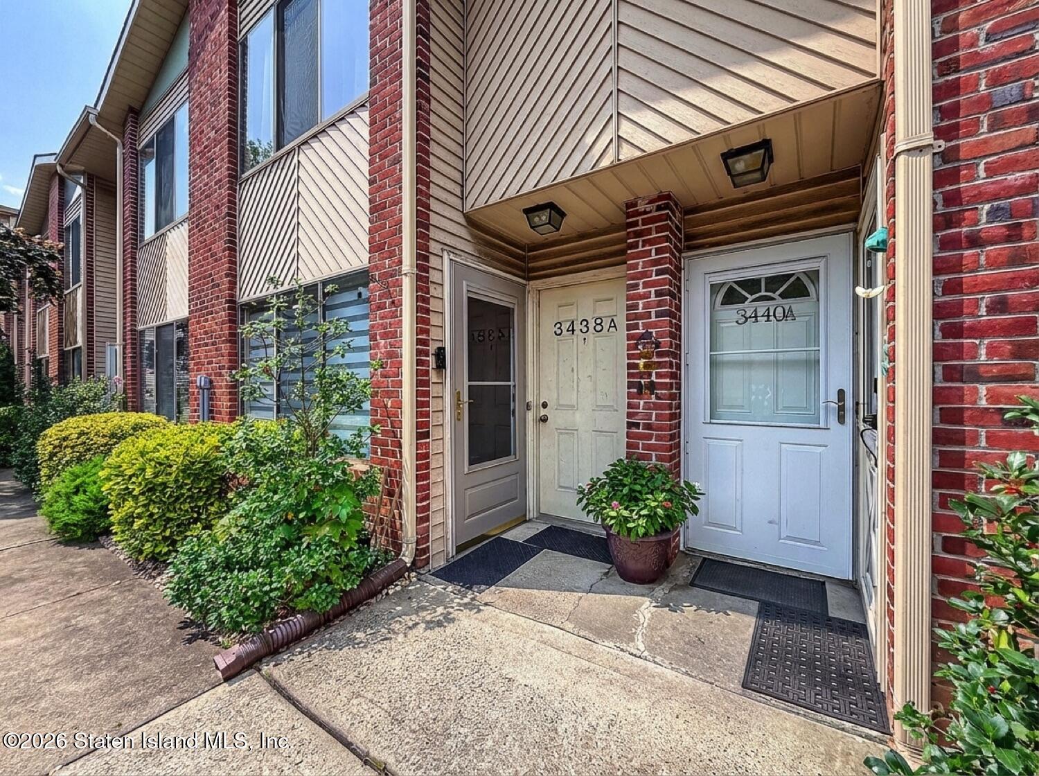 3438 A Amboy Road Staten Island, NY 10306 - Photo 3 of 21 a view of a house with potted plants