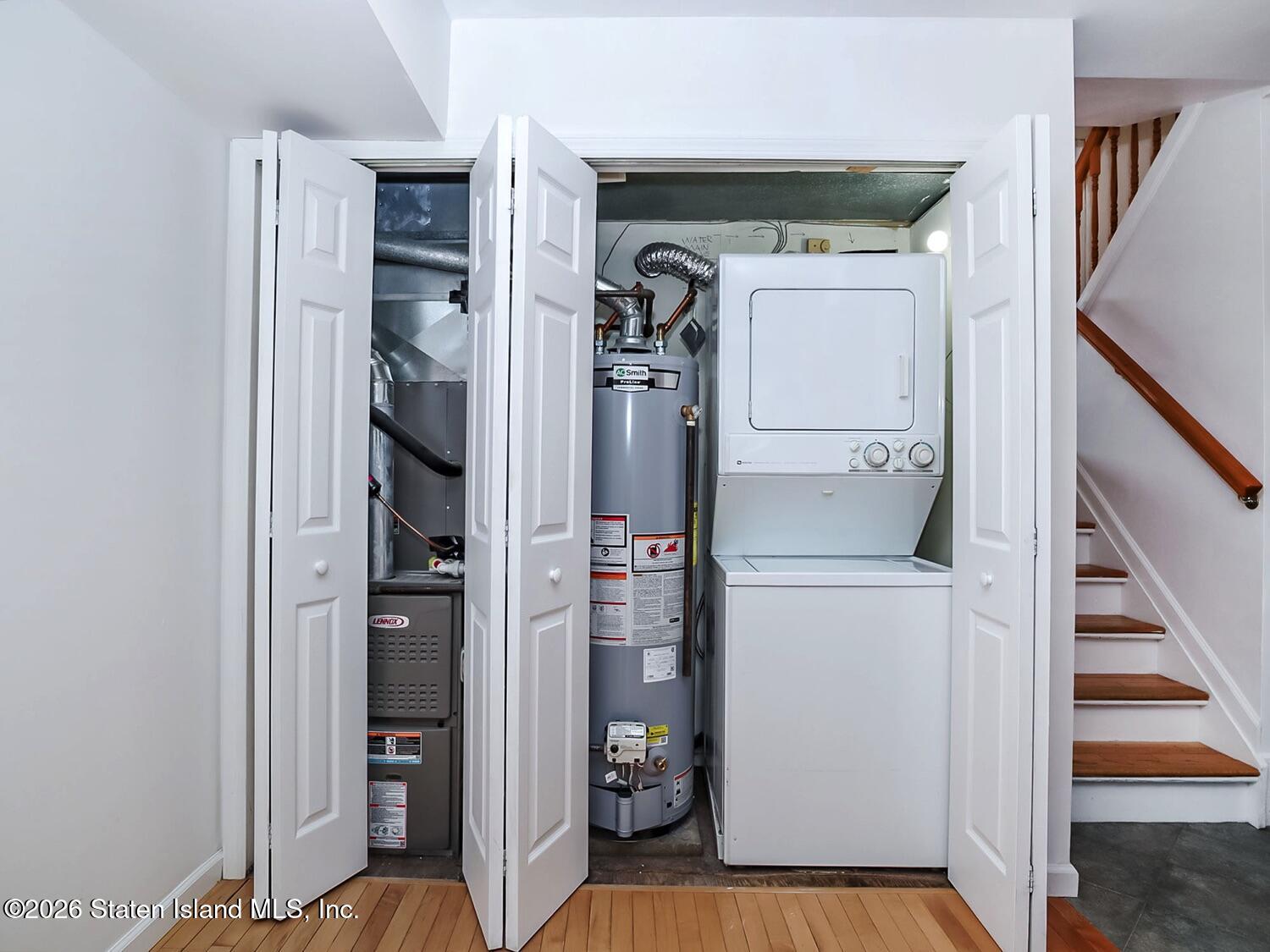 3438 A Amboy Road Staten Island, NY 10306 - Photo 10 of 21 a view of walk in closet with clothes and shoes