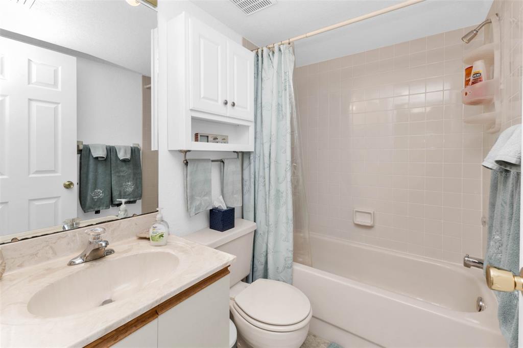 175 Kings Highway, Unit 723 Punta Gorda, FL 33983 - Photo 12 of 30 a bathroom with a sink toilet tub and shower