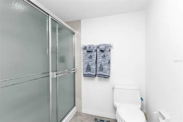 a view of a balcony with furniture