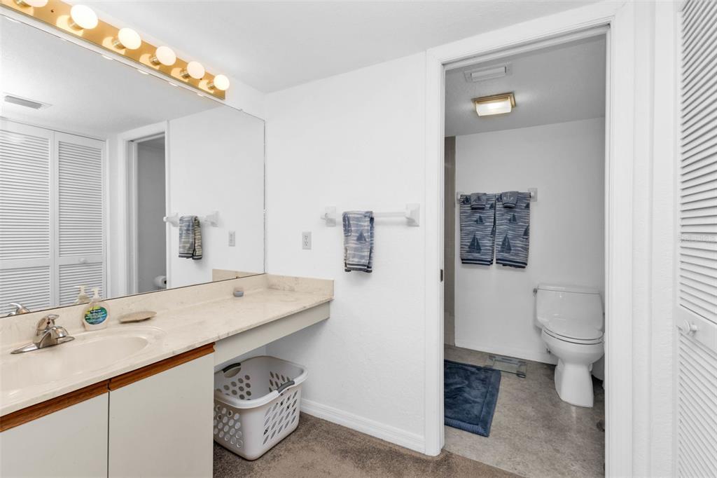 175 Kings Highway, Unit 723 Punta Gorda, FL 33983 - Photo 18 of 30 a spacious bathroom with a sink a toilet and shower