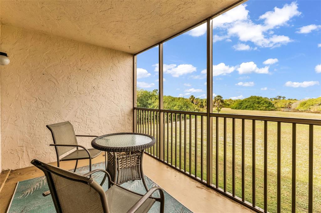 175 Kings Highway, Unit 723 Punta Gorda, FL 33983 - Photo 20 of 30 a view of a balcony with furniture