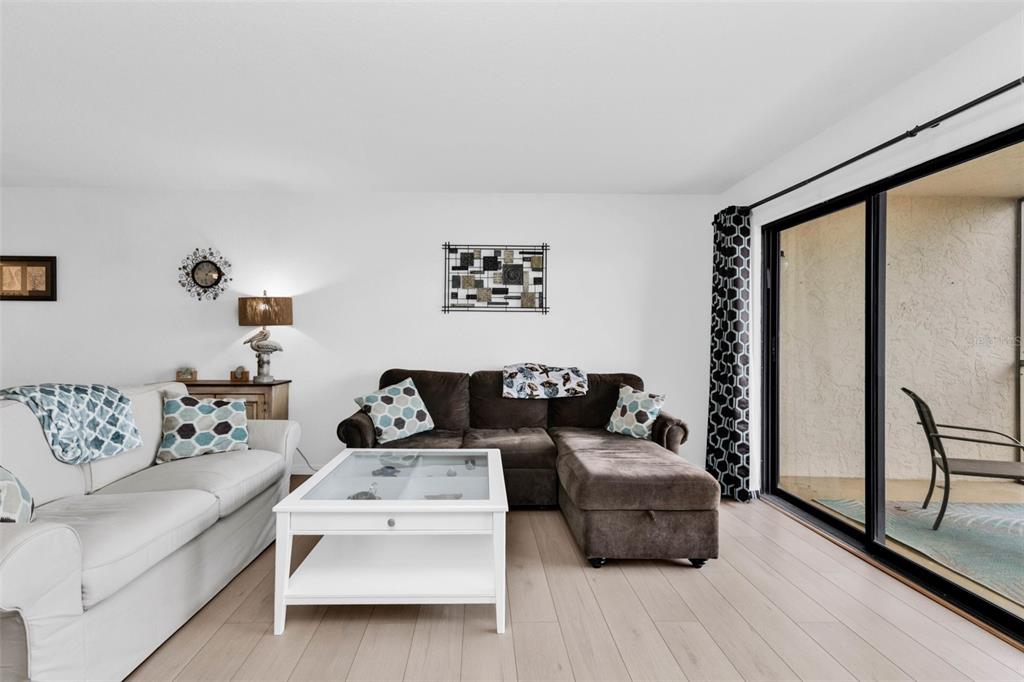 175 Kings Highway, Unit 723 Punta Gorda, FL 33983 - Photo 5 of 30 a living room with furniture