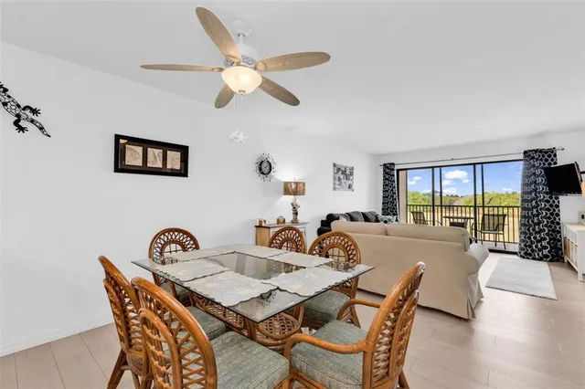 a kitchen with cabinets stainless steel appliances and a sink