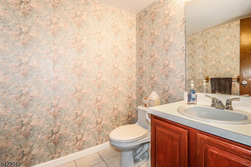 498 Auten Road Hillsborough, NJ 08844 - Photo 18 of 30 a bathroom with a sink a toilet and a mirror