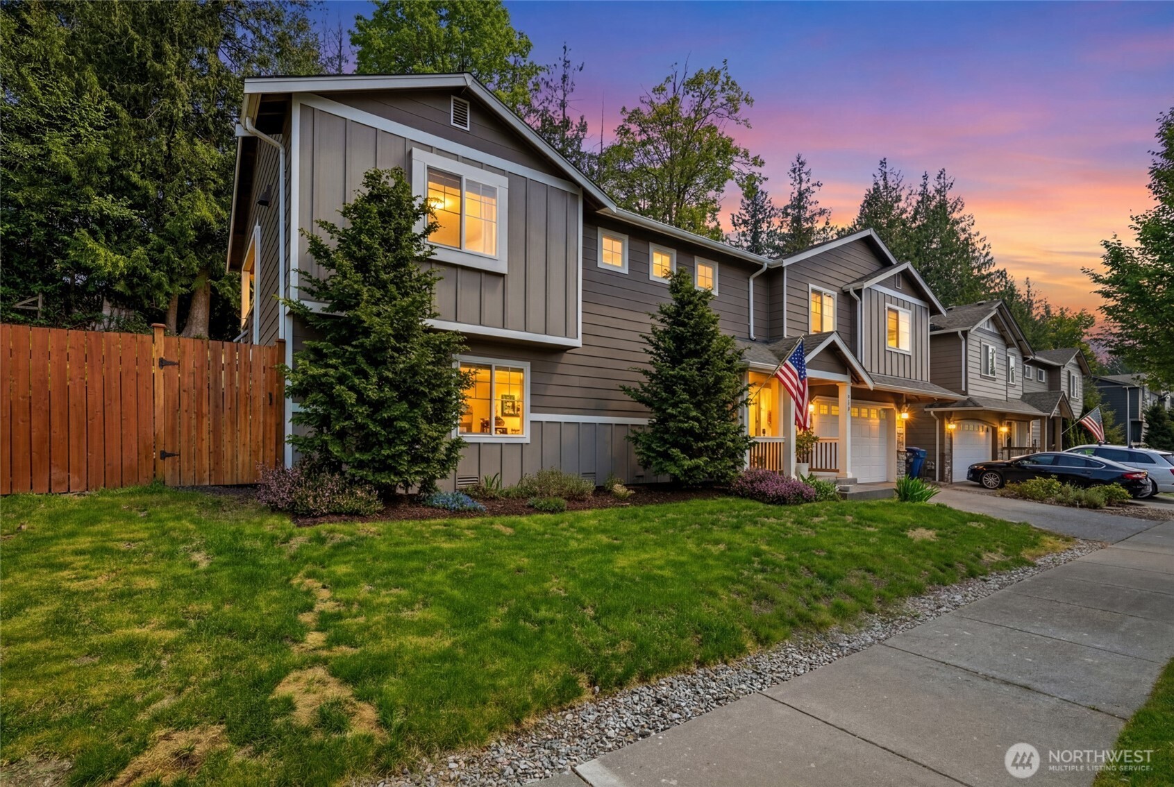 310 Jeff Street Mount Vernon, WA 98274 - Photo 1 of 35 a front view of a house with a yard and garage