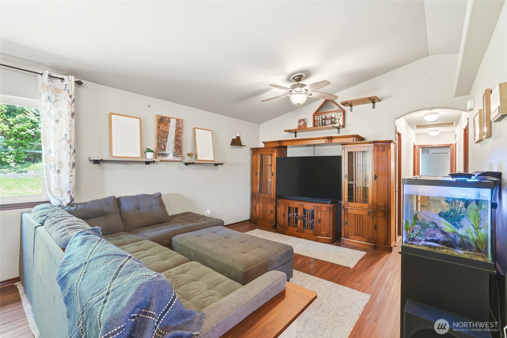 310 Jeff Street Mount Vernon, WA 98274 - Photo 15 of 35 a living room with furniture and a flat screen tv