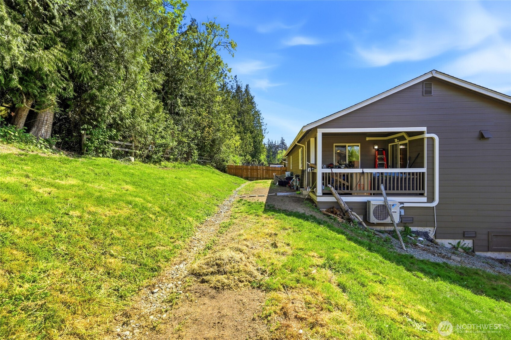 310 Jeff Street Mount Vernon, WA 98274 - Photo 29 of 35 a view of a house with backyard porch and sitting area