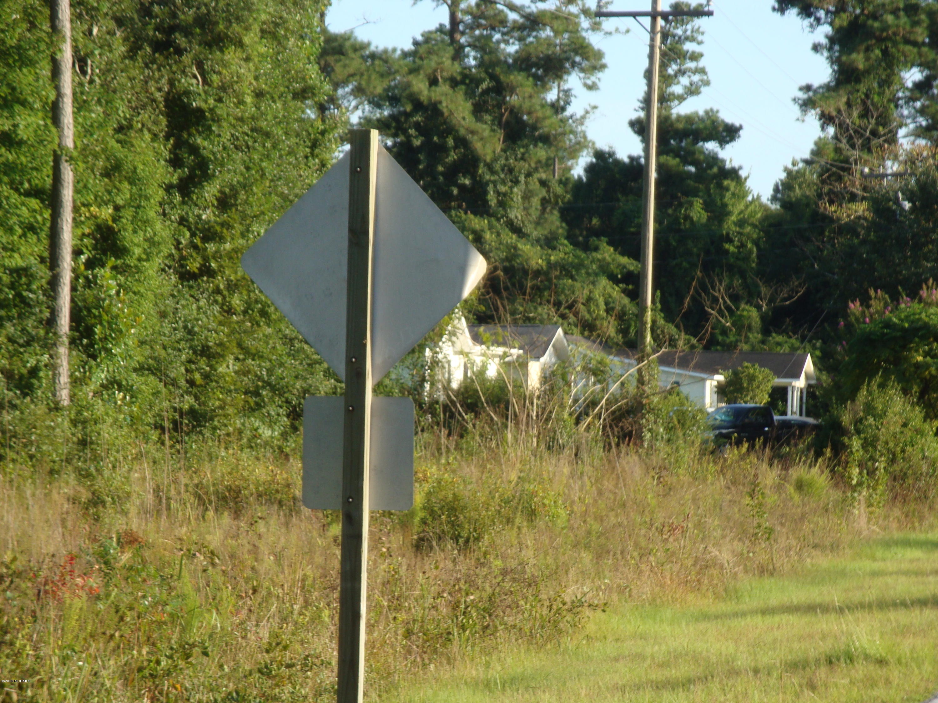Utility Pole to the Driveway