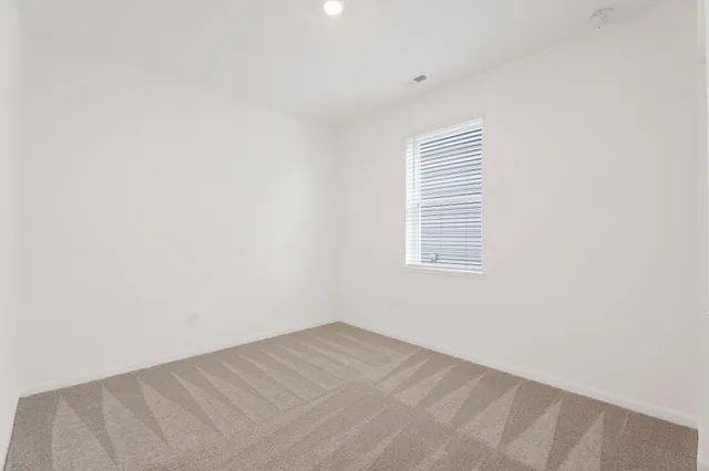 a view of a room that has a window in it