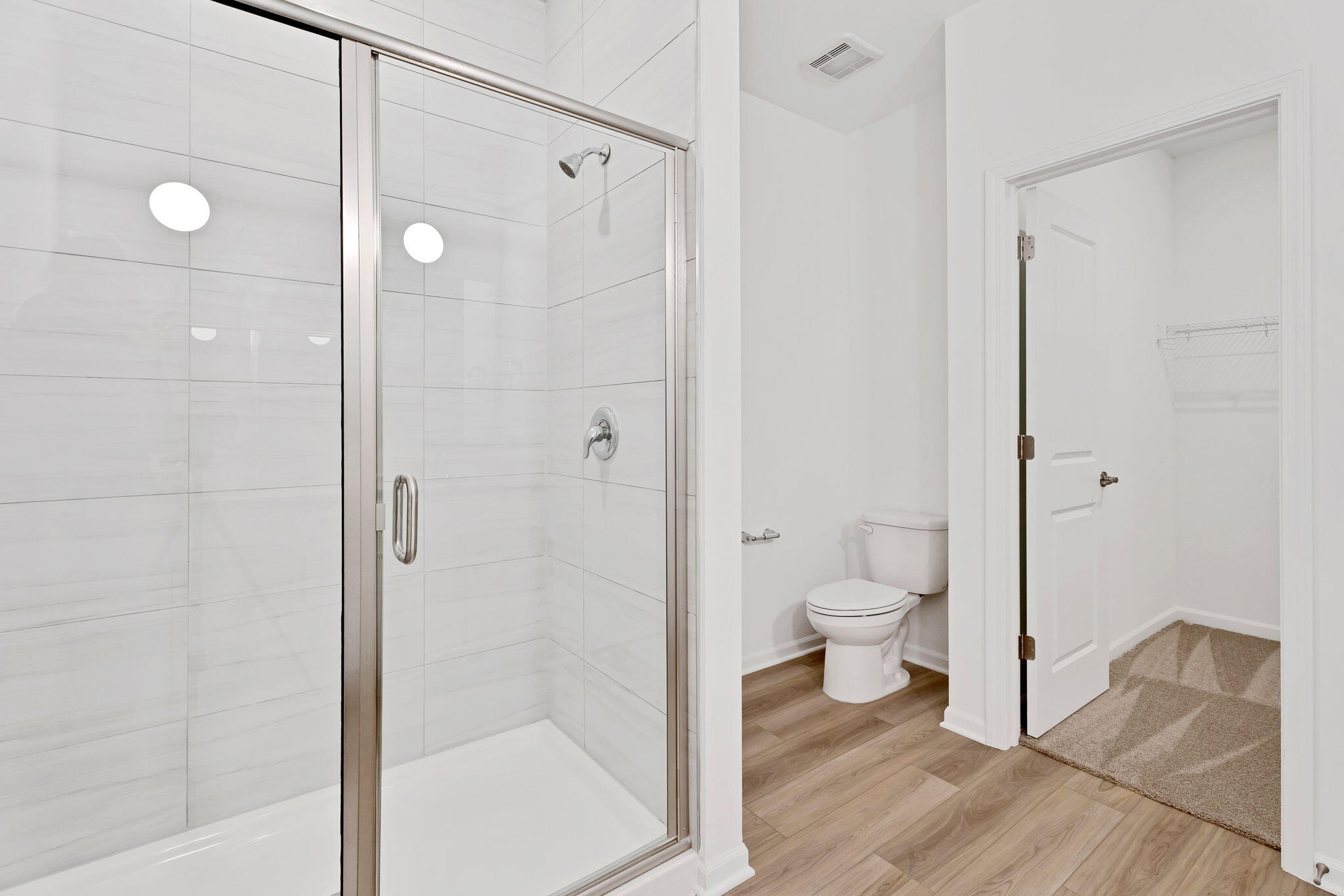 481 East 127th Lane Crown Point, IN 46307 - Photo 22 of 29 a bathroom with a granite countertop toilet a sink and shower