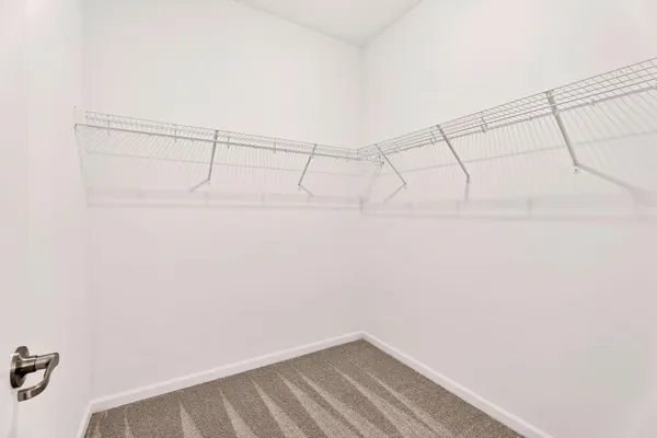a view of a room with racks on the wall