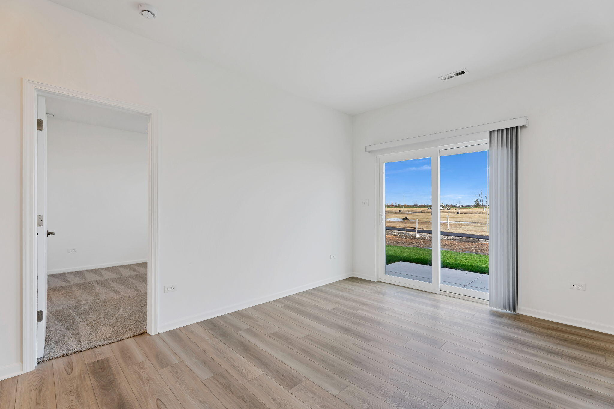 481 East 127th Lane Crown Point, IN 46307 - Photo 10 of 29 a view of a kitchen with wooden floor and a sink