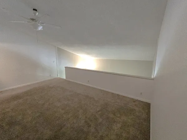 a view of a room with an empty space